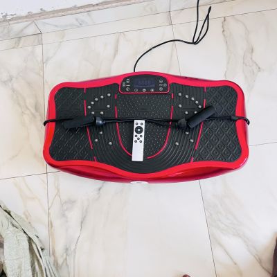 Vibration plate exercise machine